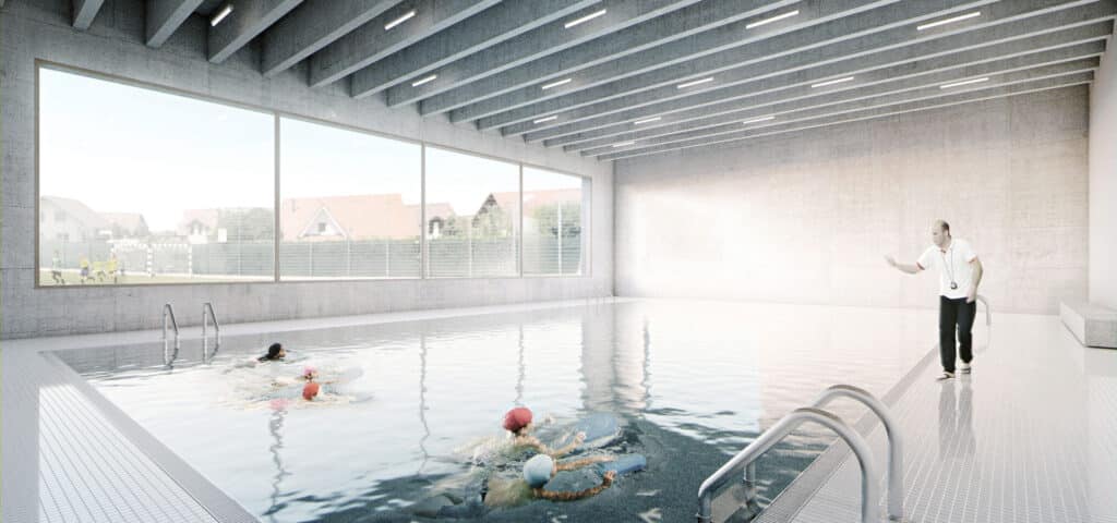 Neubau, StÄdtebau und Wettbewerb von KGRUPPE Architekten Basel - Ein Schwimmlehrer überwacht Kinder, die in einem Hallenbad schwimmen, dabei sieht man durch grosse Fenster im Hintergrund Häuser und spielende Kinder draussen.