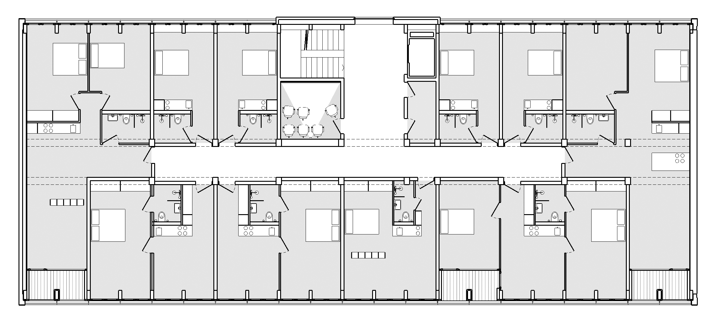 Umbau, Umnutzung und Wettbewerb von KGRUPPE Architekten Basel - Grundriss eines Wohngebäudes mit mehreren Apartments, Küche, Wohnzimmer und Bädern.